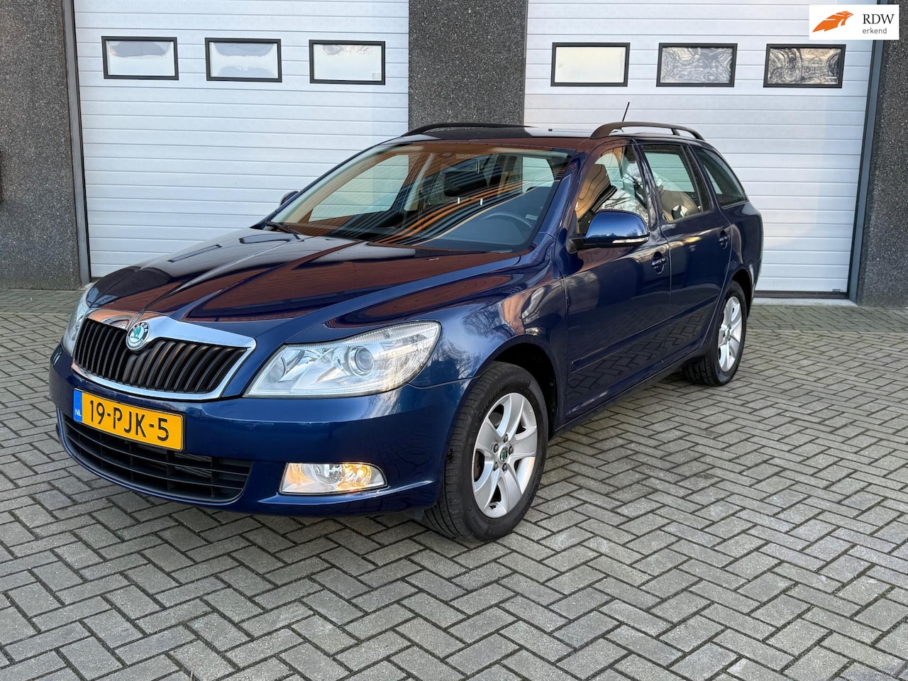 Skoda Octavia Combi - 1.2 TSI Ambition Business Line LAGE KM/AIRCO/CRUISE/NAP - AutoWereld.nl