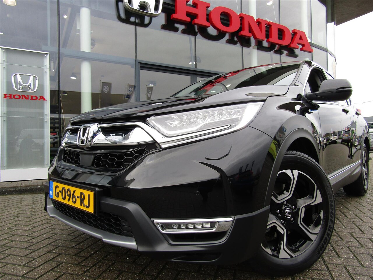 Honda CR-V - 2.0 HYBRID 184pk 2WD E-CVT Elegance, bagagerek, trekhaak, allweatherbanden - AutoWereld.nl