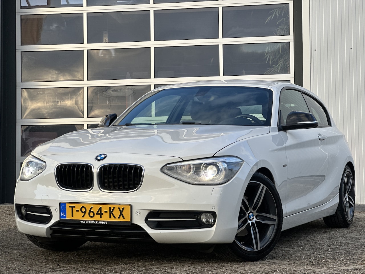 BMW 1-serie - 116i Business Sport 136pk | Bi-Xenon Koplampen | Climate Control | Pdc voor en achter | St - AutoWereld.nl