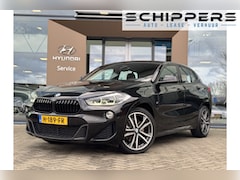 BMW X2 - sDrive20i High Executive | Voorstoelen verwarmd | M-pakket | Panoramadak |