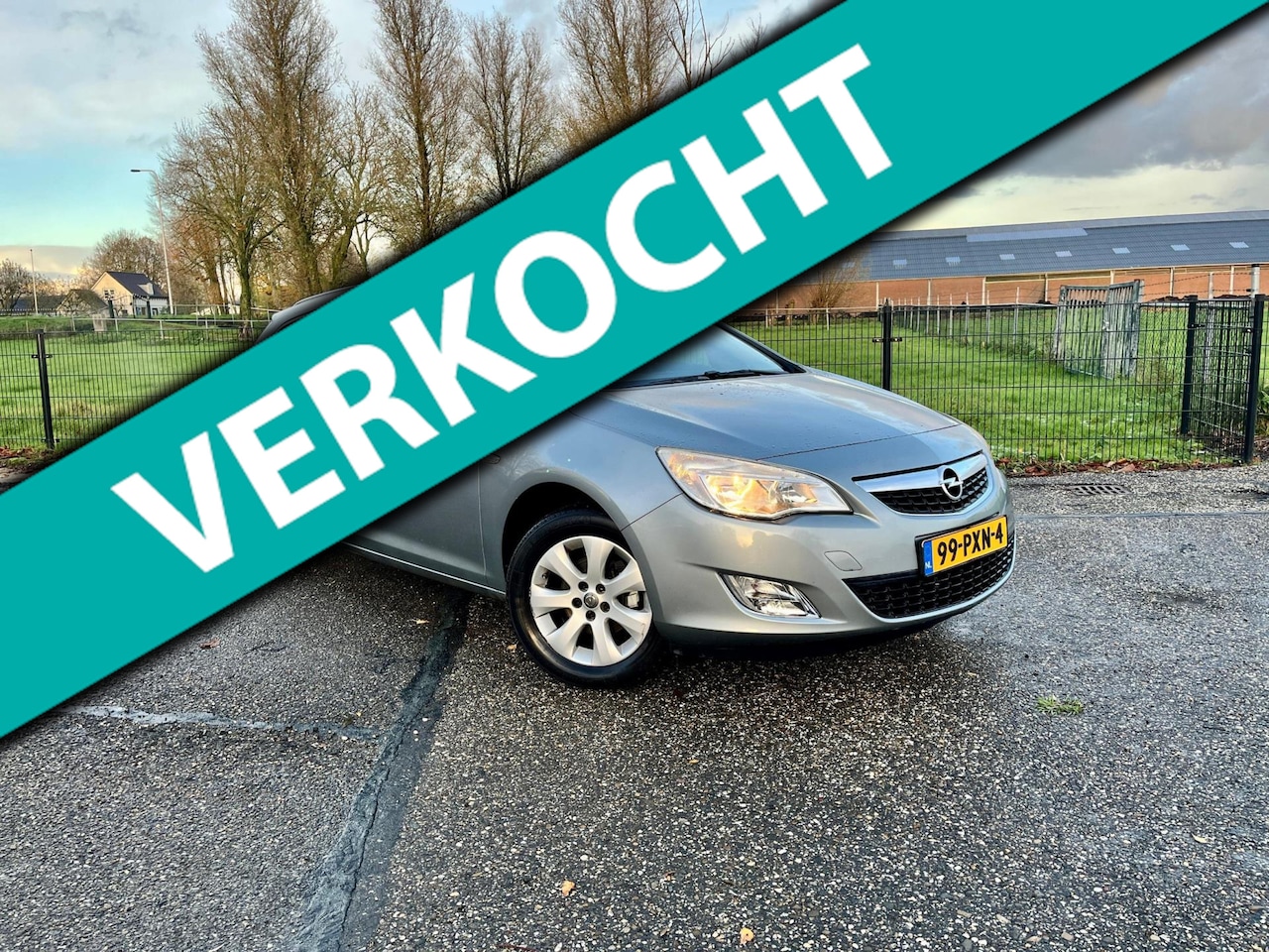 Opel Astra Sports Tourer - 1.4 Turbo Cosmo / 120pk / Lekke koppakking / Automatische klimaatregeling / - AutoWereld.nl