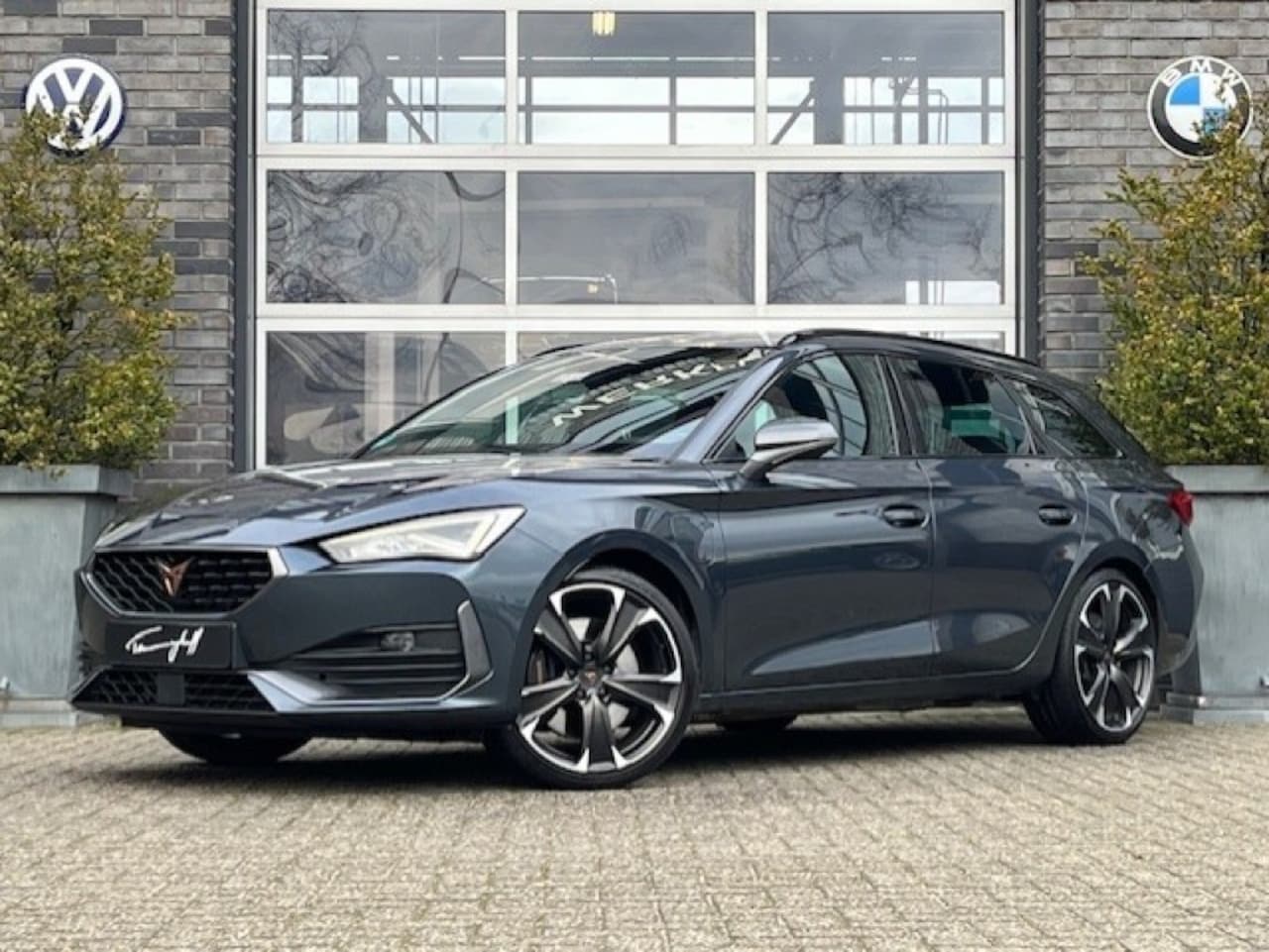 CUPRA Leon Sportstourer - 1.4 E-HYBRID VZ 245PK ADAPTIVE - TREKH. - 19 INCH - AutoWereld.nl