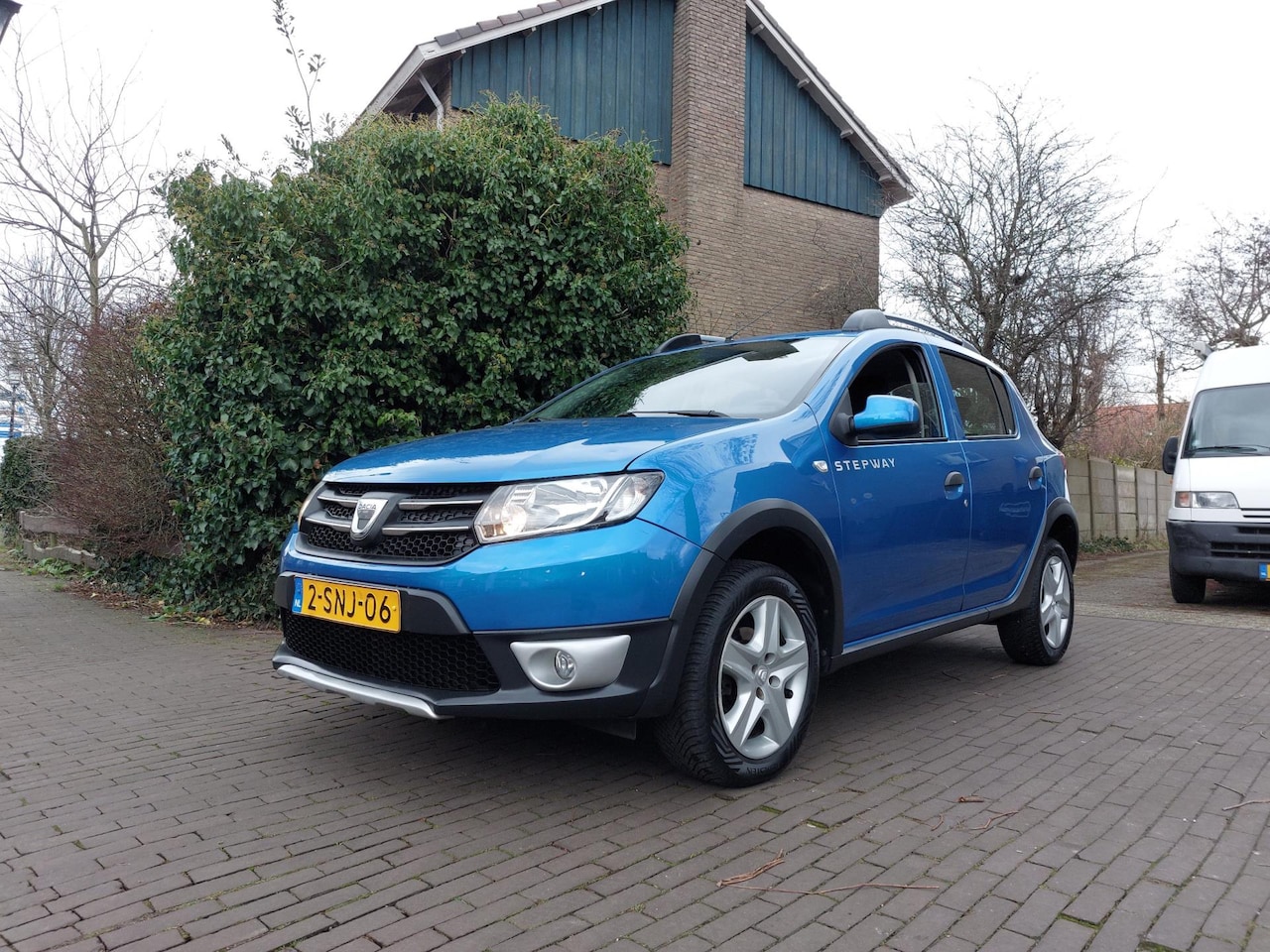 Dacia Sandero Stepway - 0.9 TCe Lauréate. AIRCO, CRUISE CONTROLE, PDC, NAVI!! - AutoWereld.nl