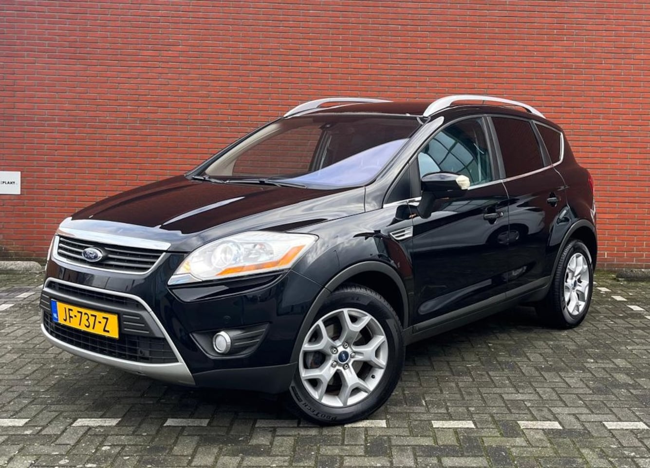 Ford Kuga - 2.0 TDCI 100KW Titanium Leer/Navigatie - AutoWereld.nl