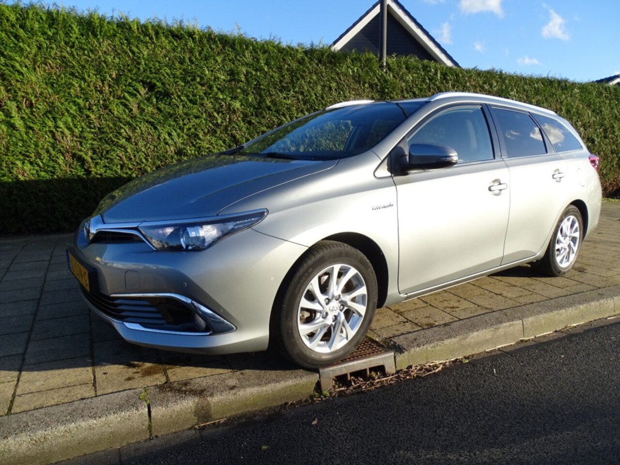 Toyota Auris - 1.8 HYBR. EXECUTIVE-Navi-Clima-Trkh-Pdc-Blth-Led-Leer - AutoWereld.nl