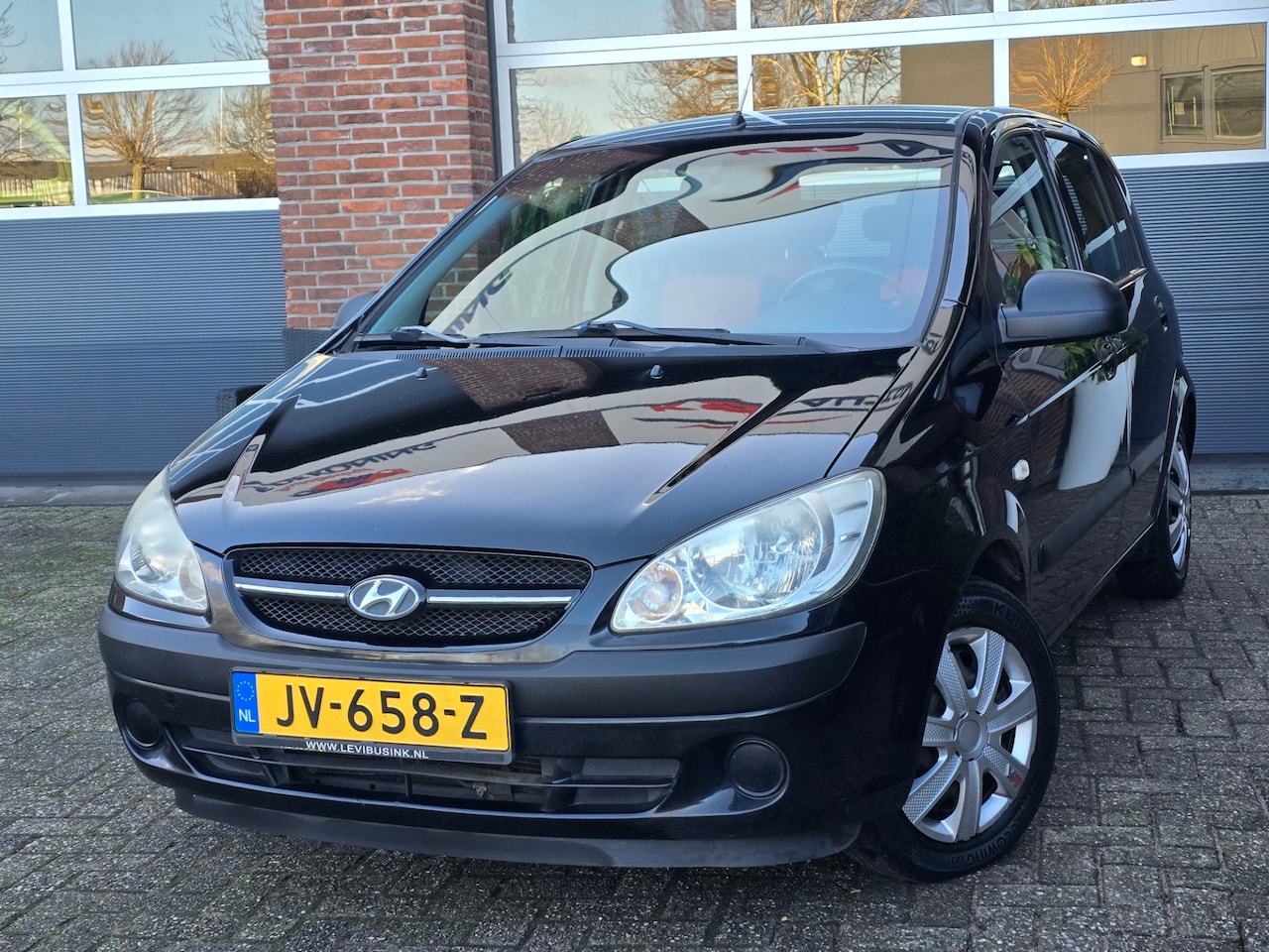 Hyundai Getz - 1.1i Active Young Apk |Airco |5DR |Zwart - AutoWereld.nl