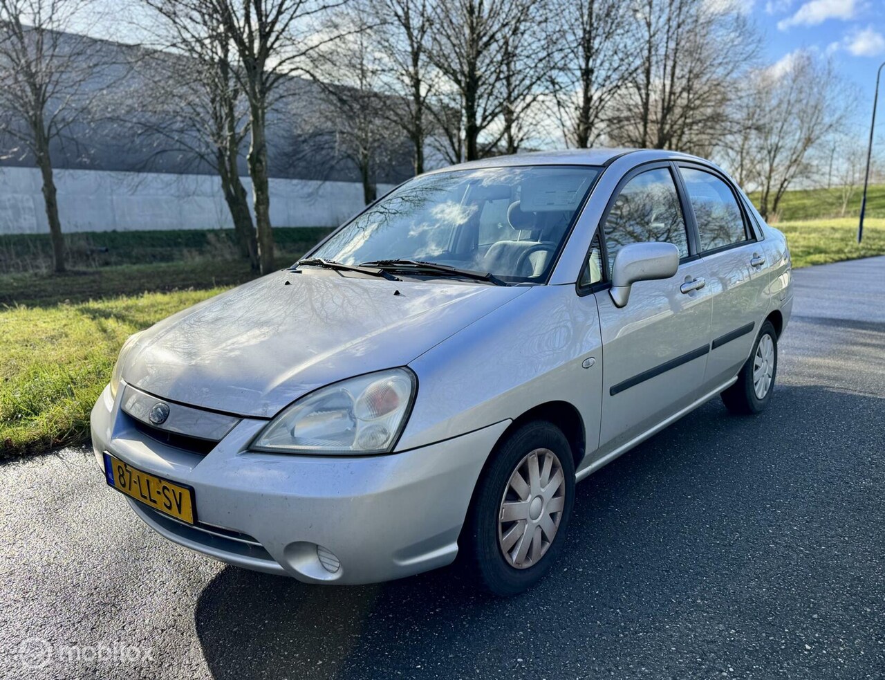 Suzuki Liana - 1.6 GLX*NEW APK 02/26*TREKHAAK*PARKEERSENSOREN - AutoWereld.nl