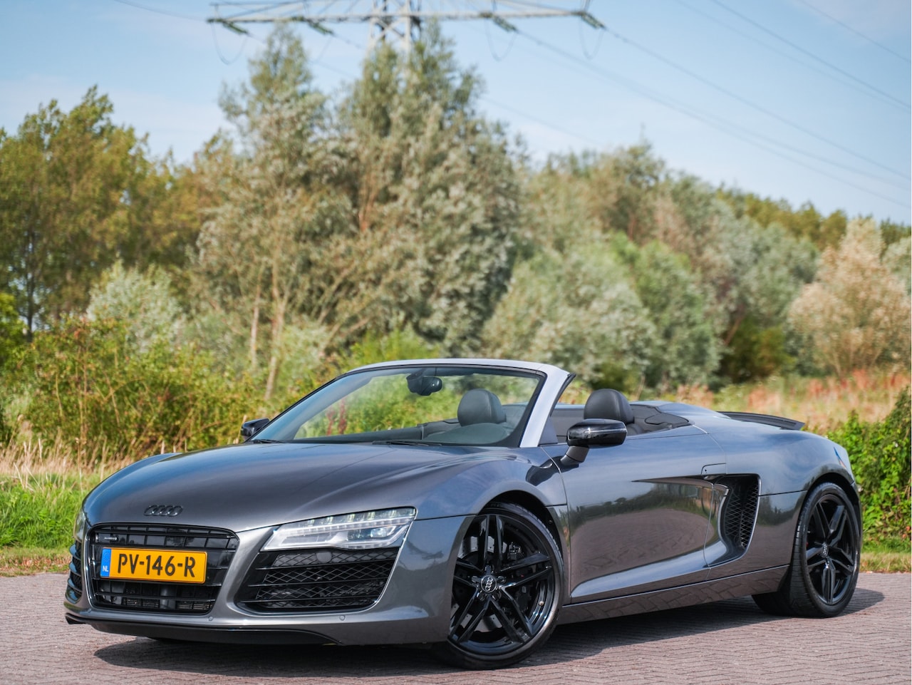 Audi R8 Spyder - 4.2 FSI quattro (capristo straightpipe,keramisch,volledige dealerhistorie,B&O) - AutoWereld.nl