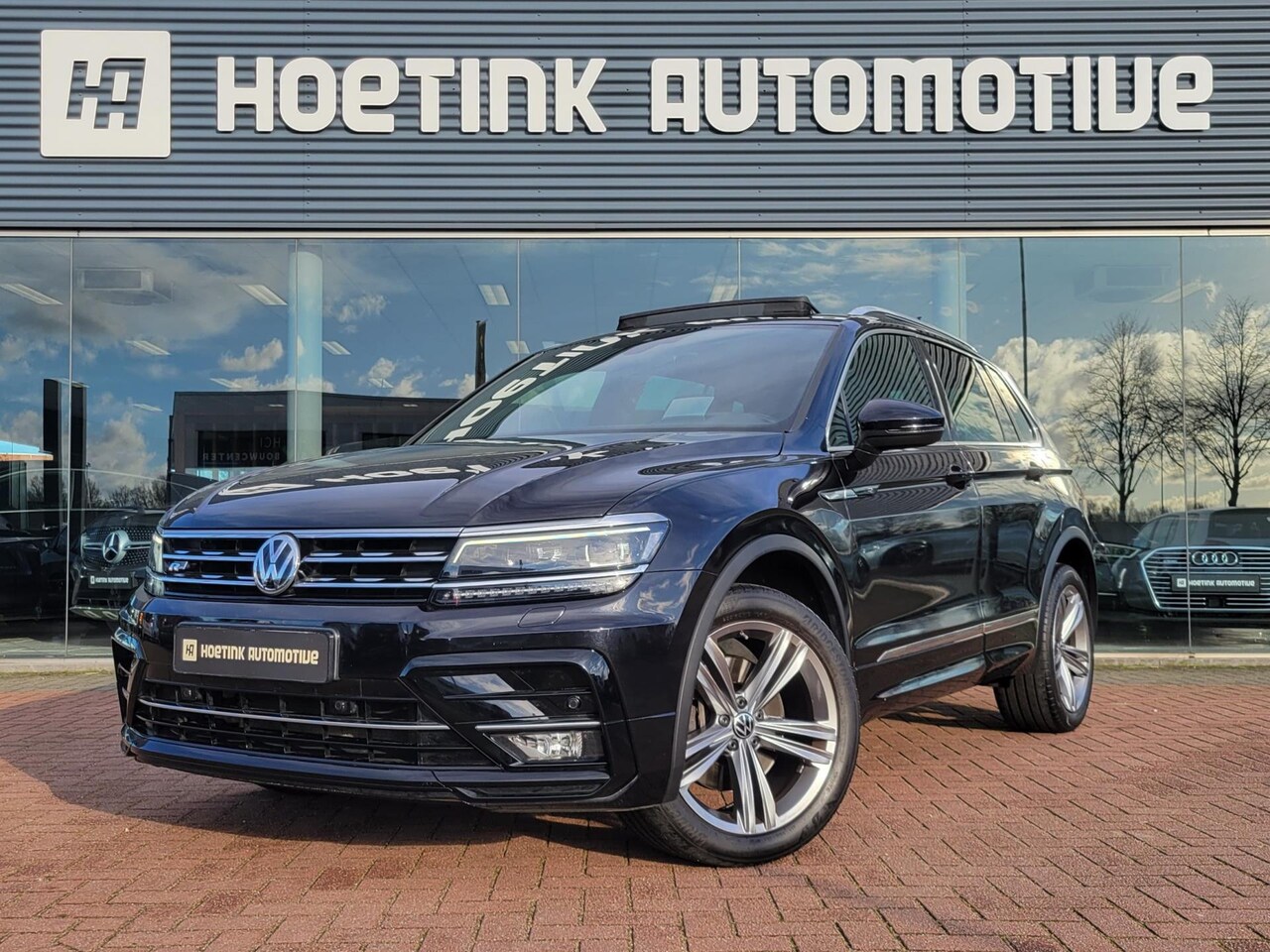 Volkswagen Tiguan - 2.0 TSI 4Motion Highline Business R | Pano | Virtual | Leer - AutoWereld.nl