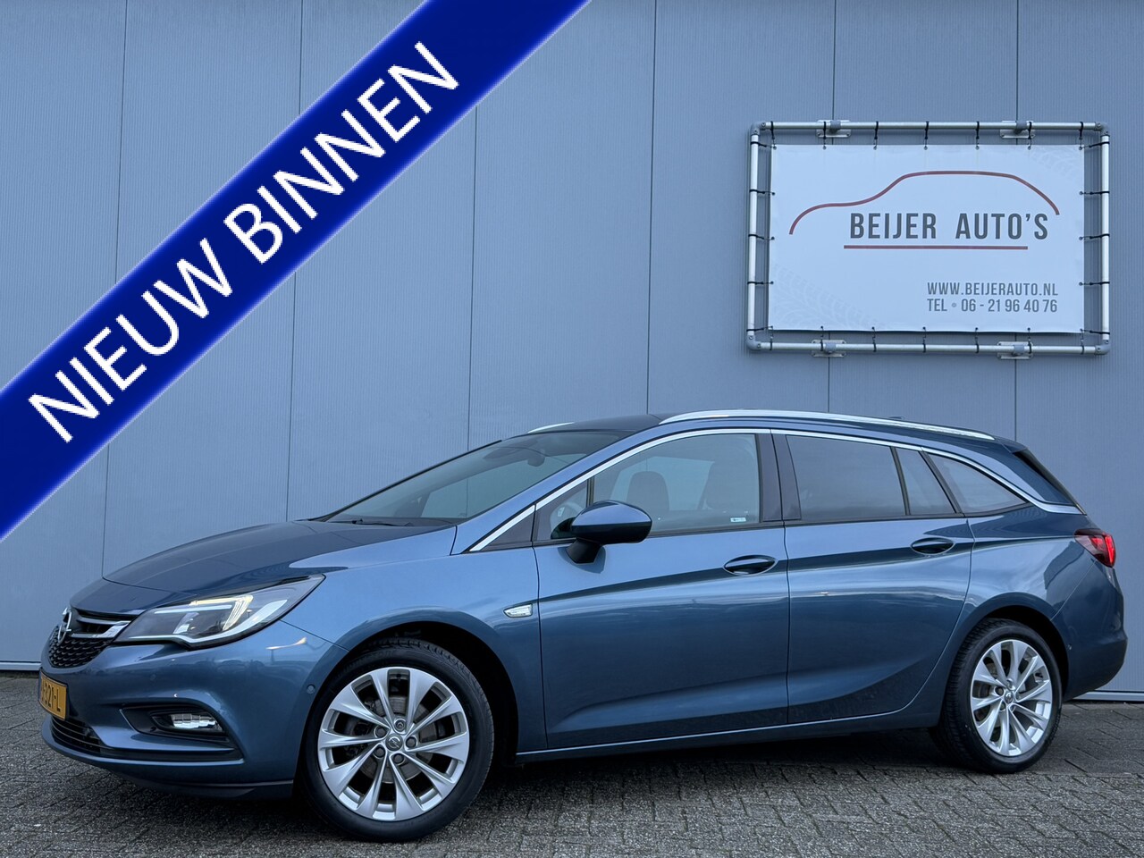 Opel Astra Sports Tourer - 1.4 Innovation Camera/Trekhaak/Cruise. - AutoWereld.nl