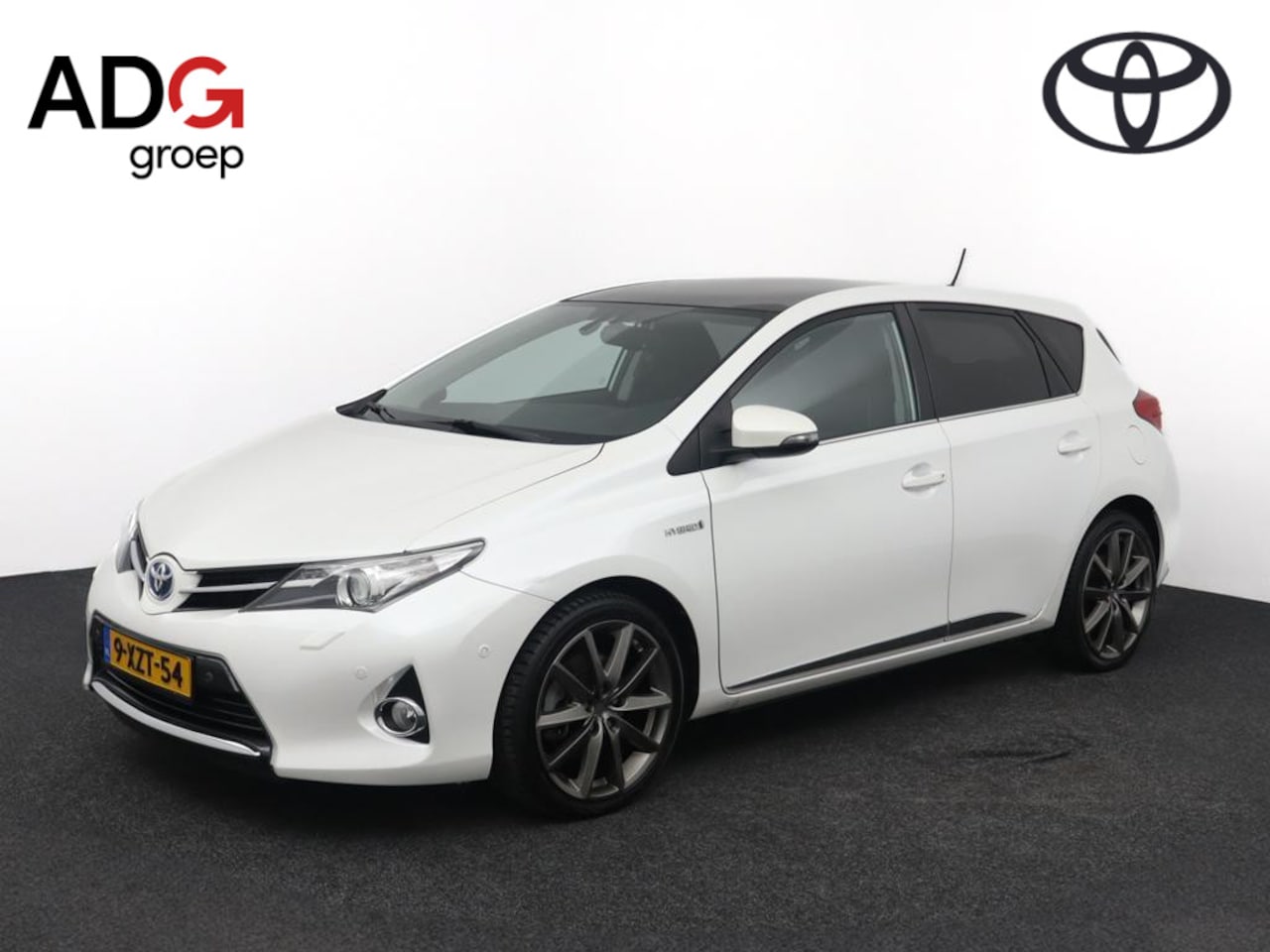 Toyota Auris - 1.8 Hybrid Lease | Trekhaak | Keyless | Parkeersensoren | Climate control | - AutoWereld.nl