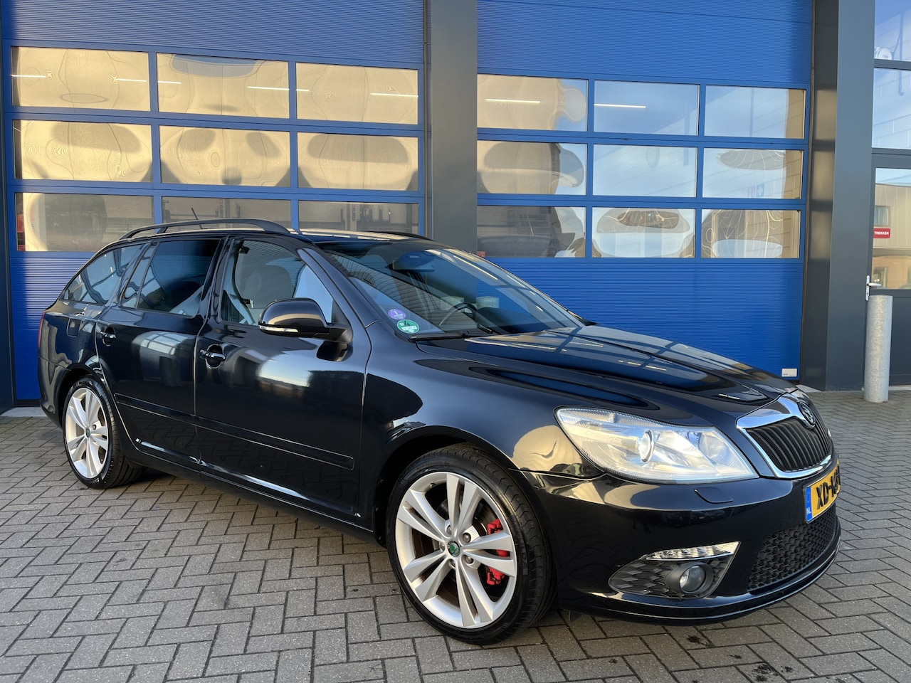 Skoda Octavia Combi - 2.0 TFSI 200pK Sport/ Navigatie/ Xenon/ RS - AutoWereld.nl