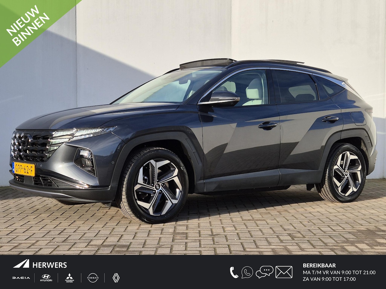 Hyundai Tucson - 1.6 T-GDI PHEV Premium Sky 4WD / Lederen Bekleding  / 19" LMV / Stuur- en Stoelverwarming - AutoWereld.nl