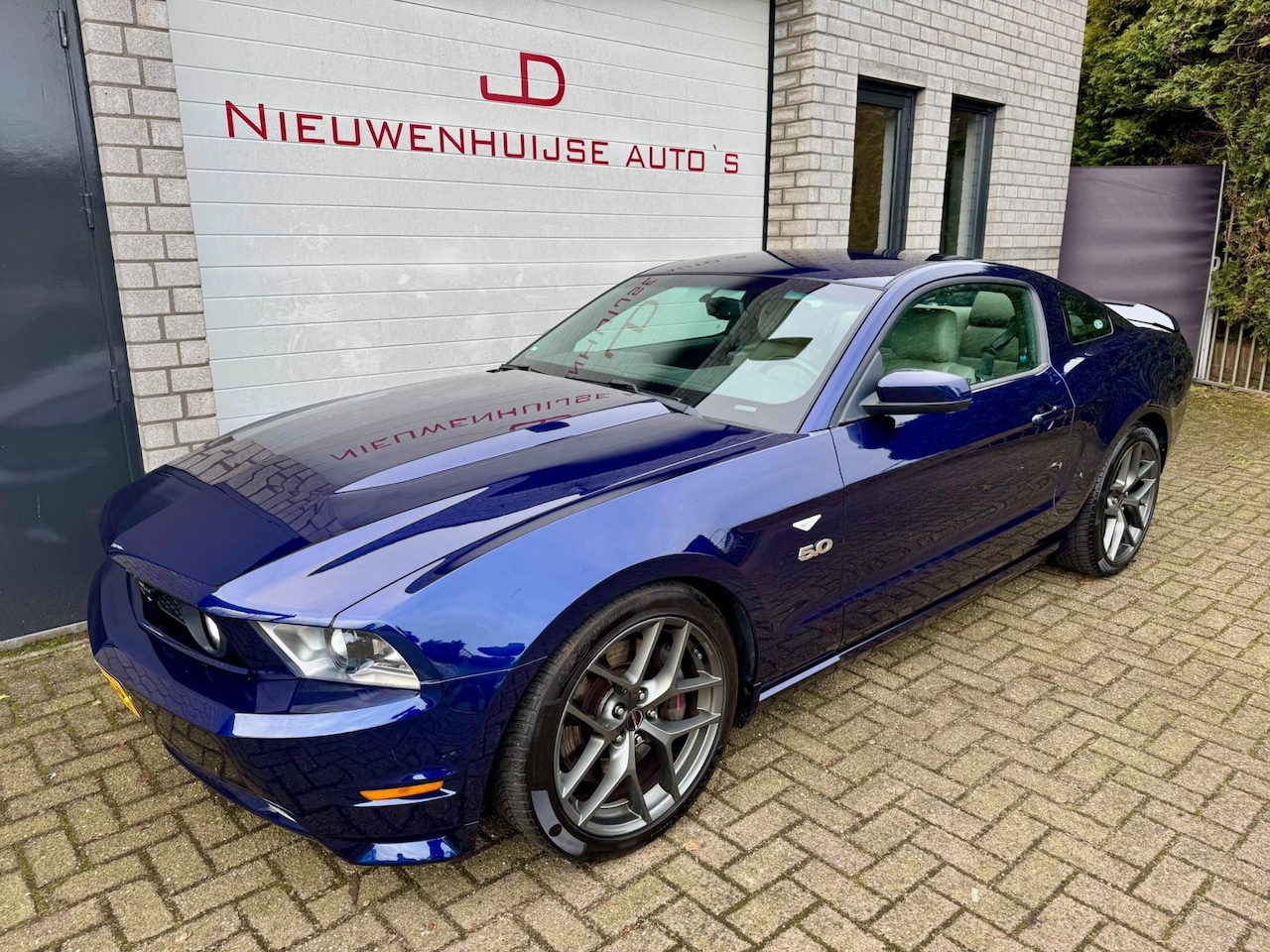 Ford Mustang - USA 5.0 V8, handbak, leder, navi, 85.361km! - AutoWereld.nl