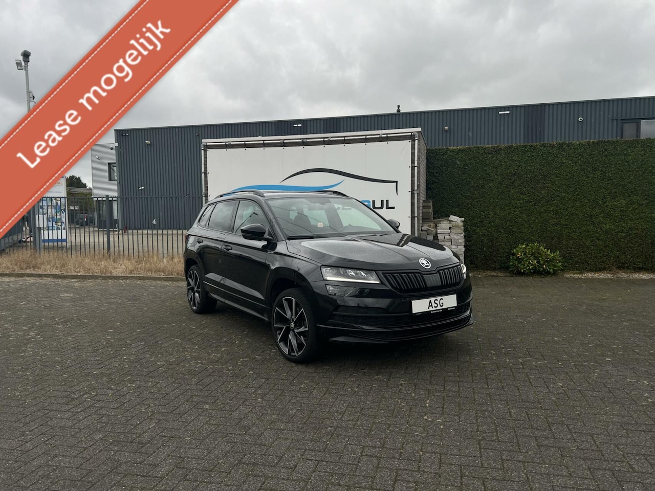 Skoda Karoq - 1.5 TSI ACT Sportline Business 1.5 TSI ACT Sportline Business - AutoWereld.nl