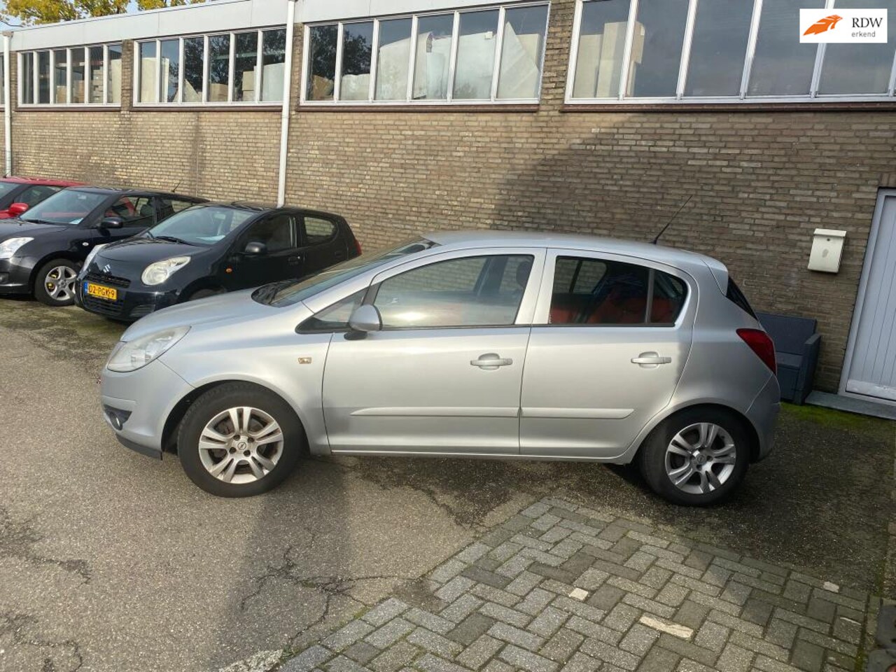 Opel Corsa - 1.2-16V Enjoy 1.2-16V Enjoy - AutoWereld.nl