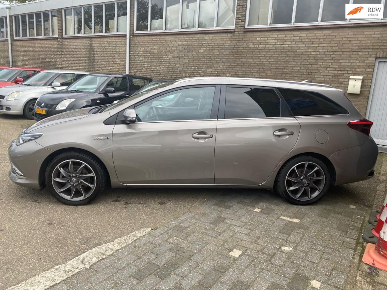 Toyota Auris Touring Sports - 1.8 Hybrid Lease Pro 1.8 Hybrid Lease pro - AutoWereld.nl