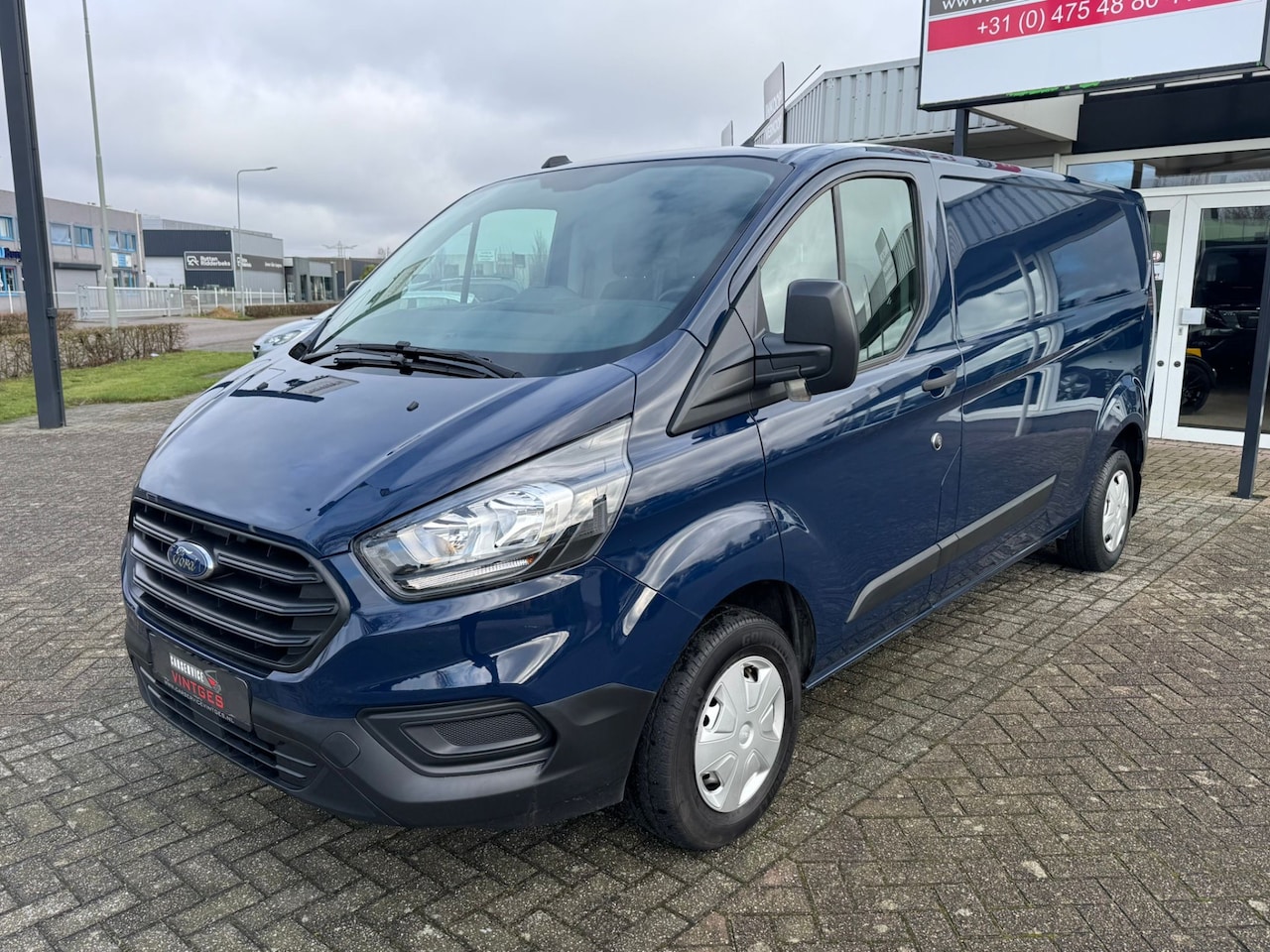 Ford Transit Custom - 300 2.0 TDCI L2H1 Ambiente Airco Lengte 2 Zeer lage kmstand!!! - AutoWereld.nl