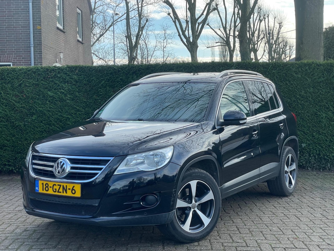 Volkswagen Tiguan - 1.4 TSI Sport&Style 4Motion|LEER|LM VELG|PDC| - AutoWereld.nl