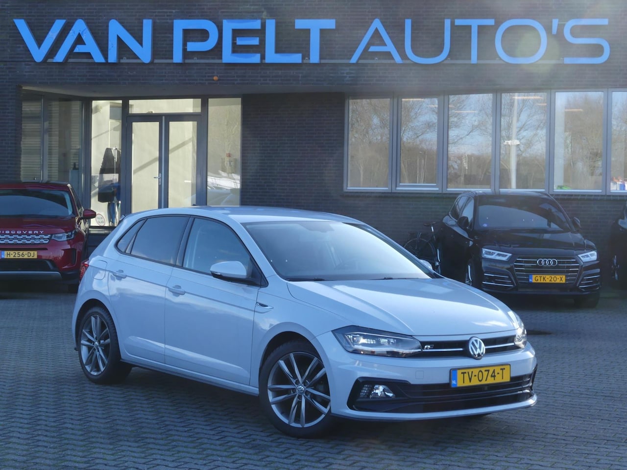 Volkswagen Polo - 1.0 TSI Highline R-Line / LEDER / LED / BEATS - AutoWereld.nl