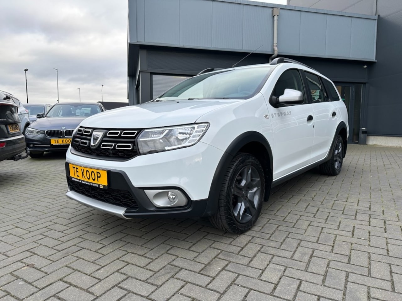 Dacia Logan MCV - 0.9TCe Stepway Wit, CarPass, navigatie, cruise control - AutoWereld.nl