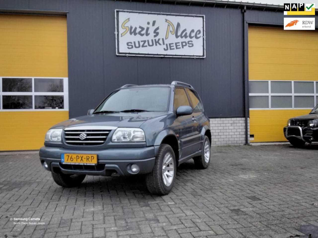 Suzuki Grand Vitara - 1.6 Metal Top FreeStyle-3 1.6 Metal Top FreeStyle-3 - AutoWereld.nl