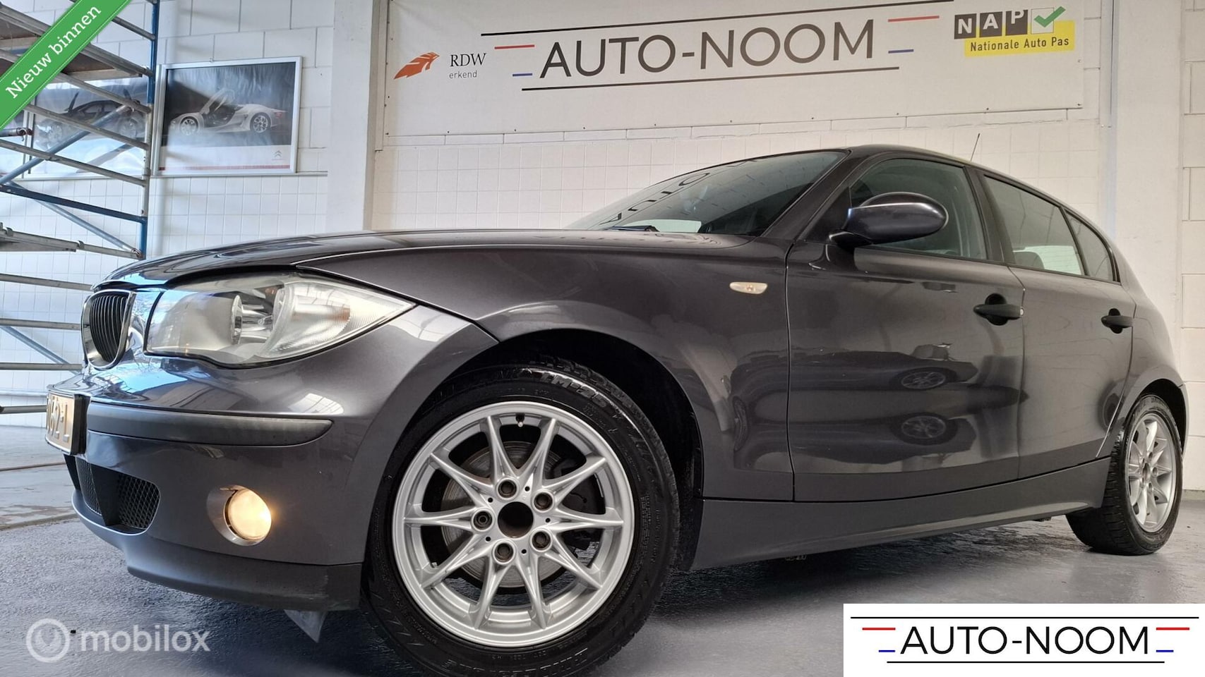 BMW 1-serie - 116i AIRCO/ECC/16"LM/ZOMER&WINTERSET/NETTE AUTO ✔️ - AutoWereld.nl