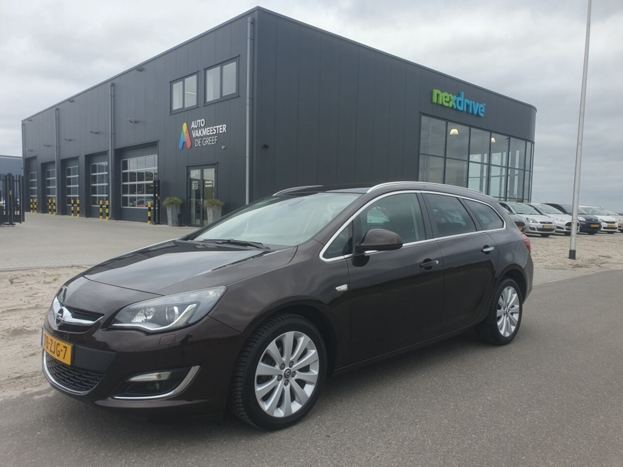 Opel Astra Sports Tourer - 1.4 Turbo Cosmo+ Executive Xenon 1e eigenaar - AutoWereld.nl