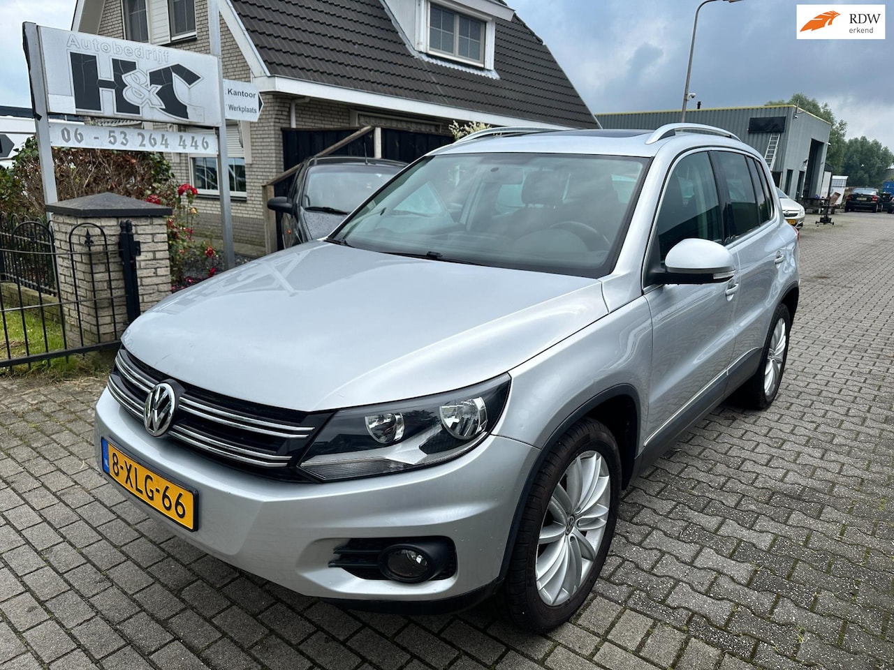 Volkswagen Tiguan - 2.0 TDI Sport&Style 4Motion - AutoWereld.nl