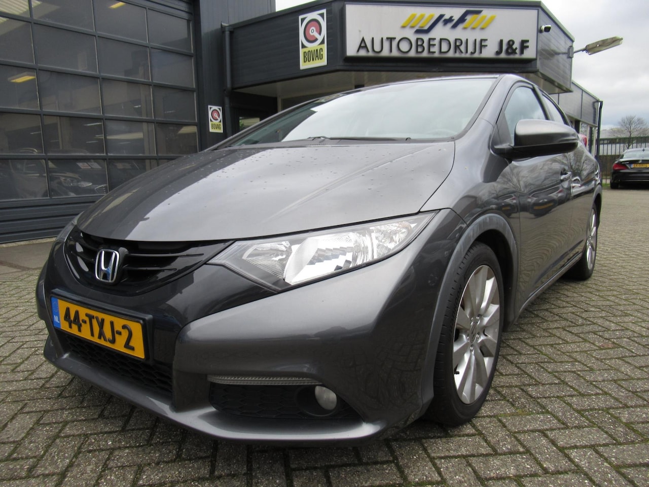 Honda Civic - 1.4 Sport / Camera / Climate Control / Bleutooth - AutoWereld.nl