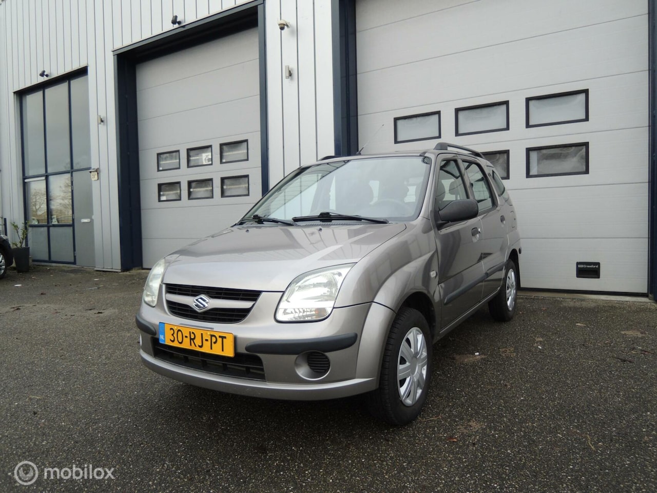 Suzuki Ignis - 1.3-16V GL 1ste Eigenaar! Dealer onderhouden! - AutoWereld.nl