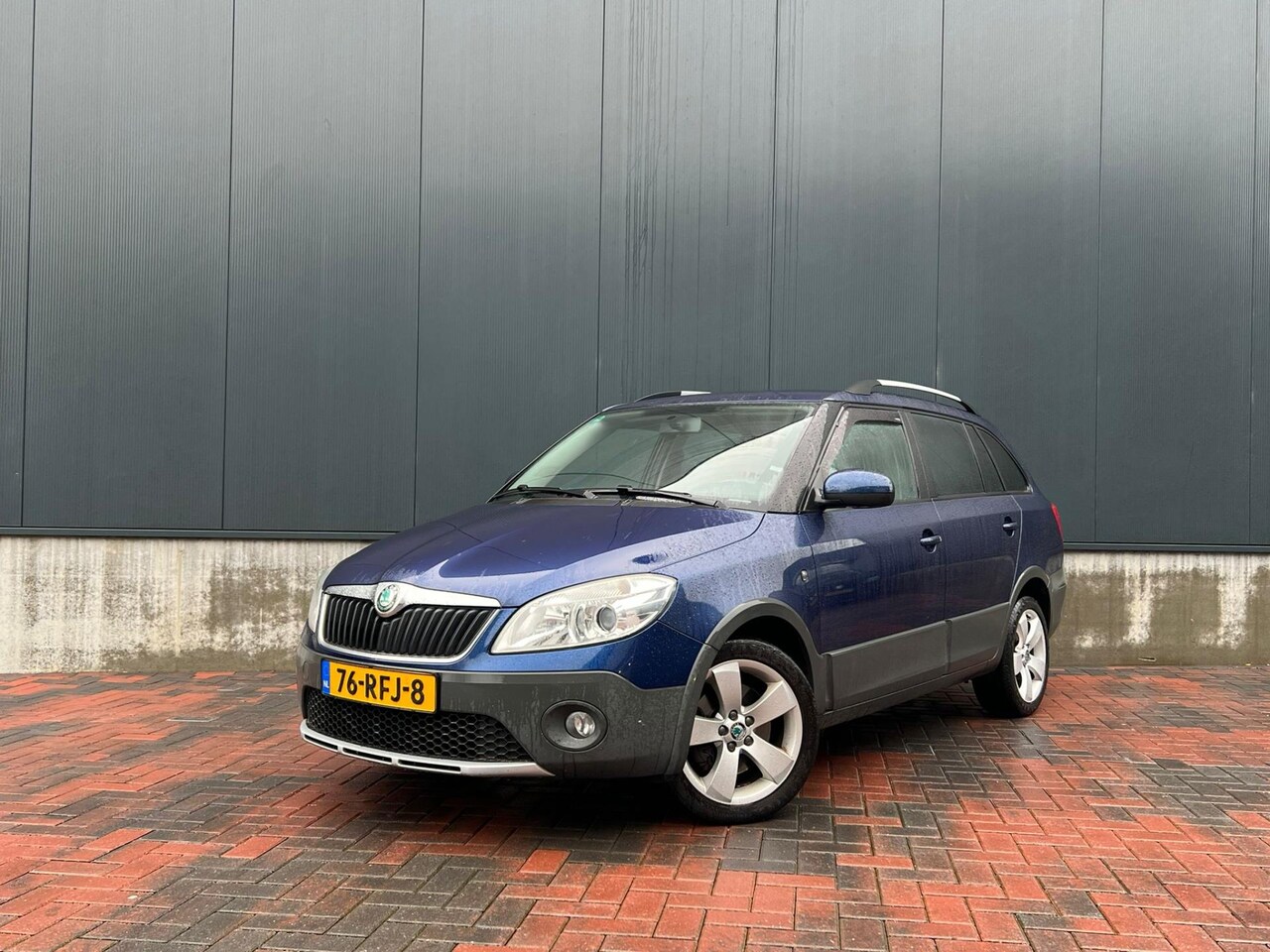 Skoda Fabia Combi - 1.2 TSI Scout * Aut * Climate * Cruise * Trekhaak - AutoWereld.nl