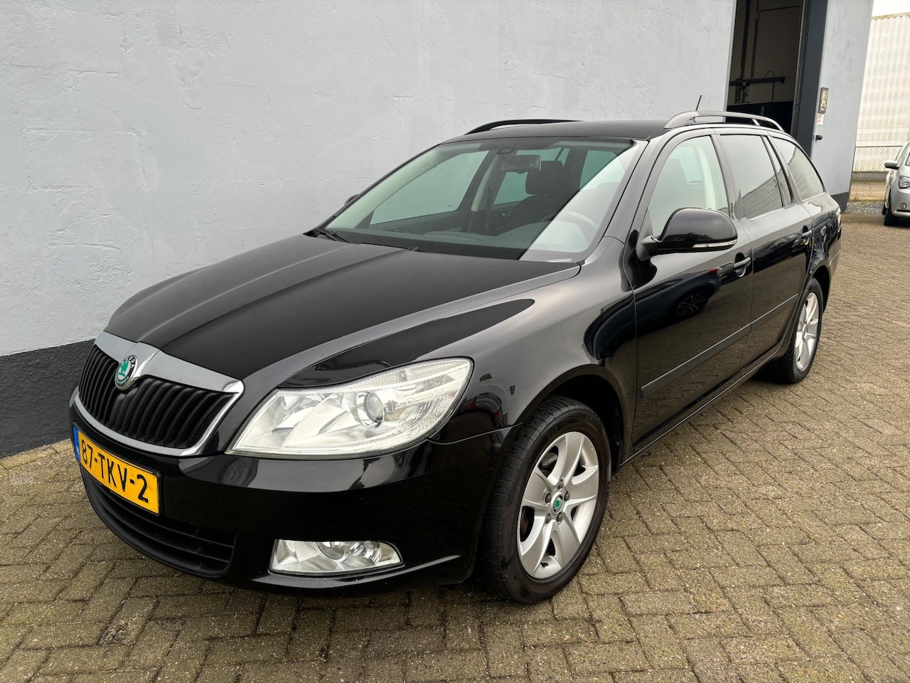 Skoda Octavia Combi - 1.2 TSI Ambition Business Line - Trekhaak - AutoWereld.nl