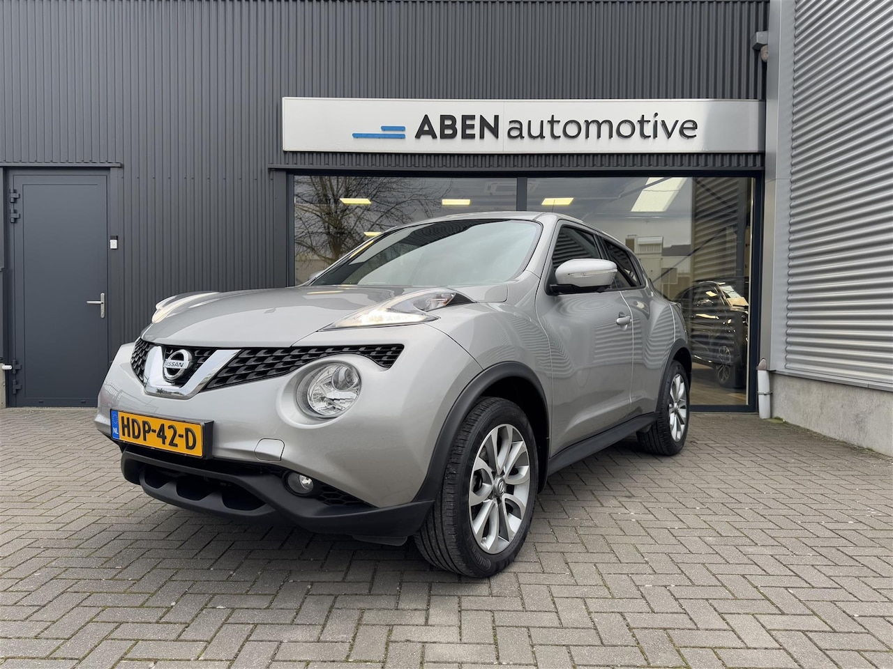 Nissan Juke - 1.6 117PK N-Connecta automaat (360 CAMERA|TREKHAAK|NAVI|KEYLESS) - AutoWereld.nl