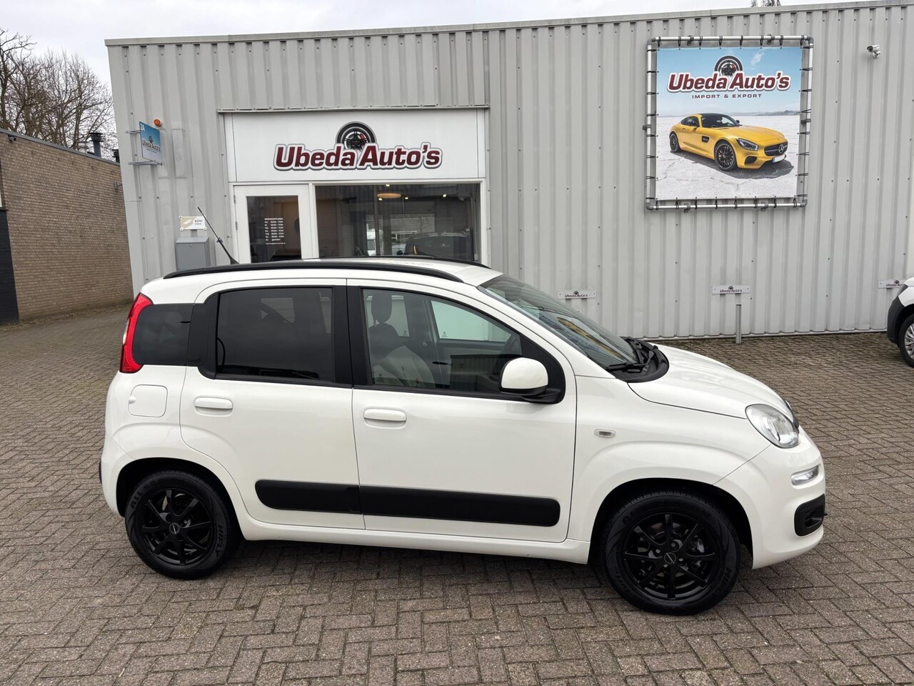 Fiat Panda - 0.9 TwinAir Lounge NL AUTO KM 130600 NAP ZEER MOOI 4500E - AutoWereld.nl