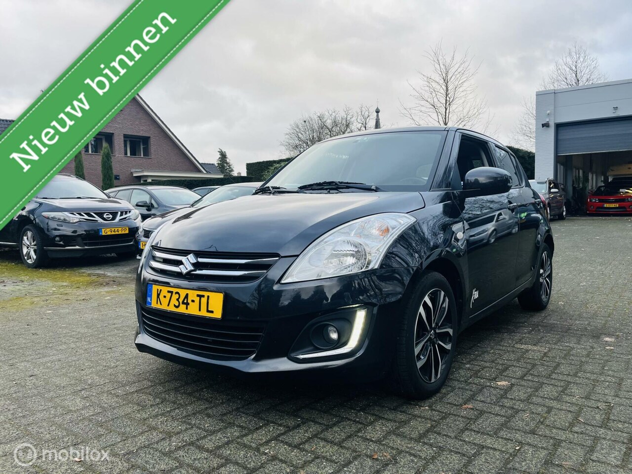 Suzuki Swift - 1.2 Bandit EASSS 5 drs / Cruise / Audio / LM / Stoelverwarming - AutoWereld.nl