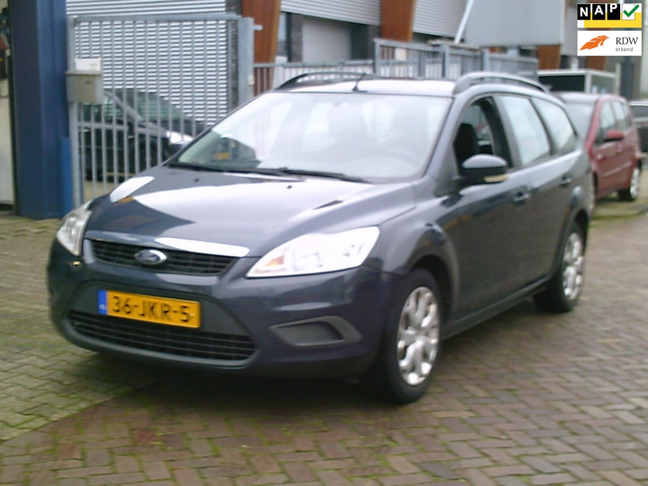 Ford Focus Wagon - 1.4 Trend Airco Cruise Navi Trekhaak - AutoWereld.nl