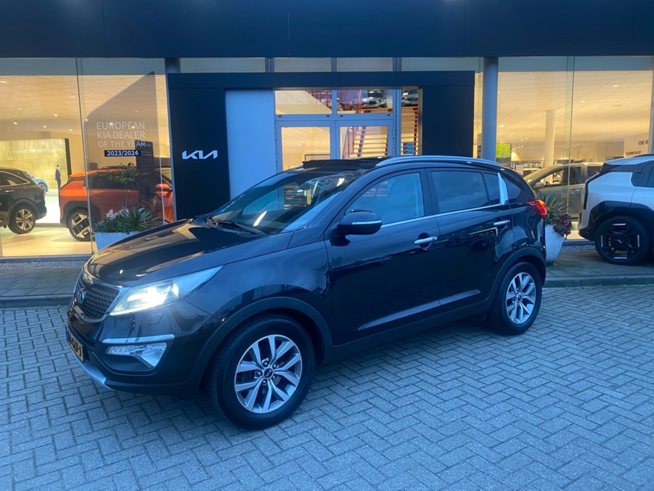 Kia Sportage - 1.6 GDI X-treme ExecutiveLine SchuifDak // Leder // Camera // Key-less // PDC // Trekhaak - AutoWereld.nl