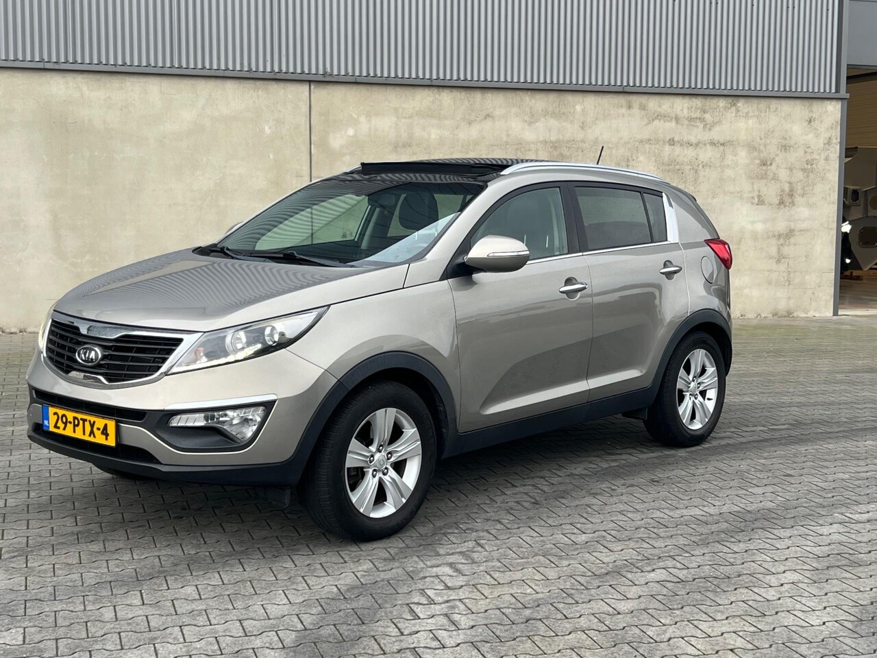 Kia Sportage - 1.6 GDI X-ecutive Plus Pack PANORAMADAK+158.000 KM NAP+FULL MAP NAVI MET CAMERA+HALF LEDER - AutoWereld.nl