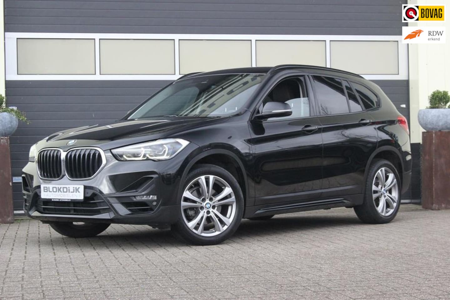 BMW X1 - 1.8i sDrive High Executive | Trekhaak | Camera | - AutoWereld.nl