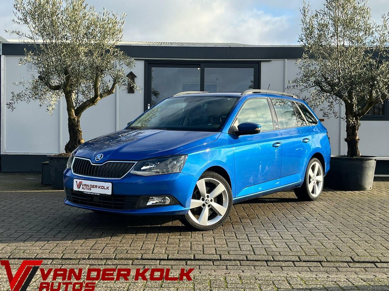 Skoda Fabia Combi - 1.2 TSI JOY Automaat Navi CarPlay Cruise Climate Trekhaak - AutoWereld.nl