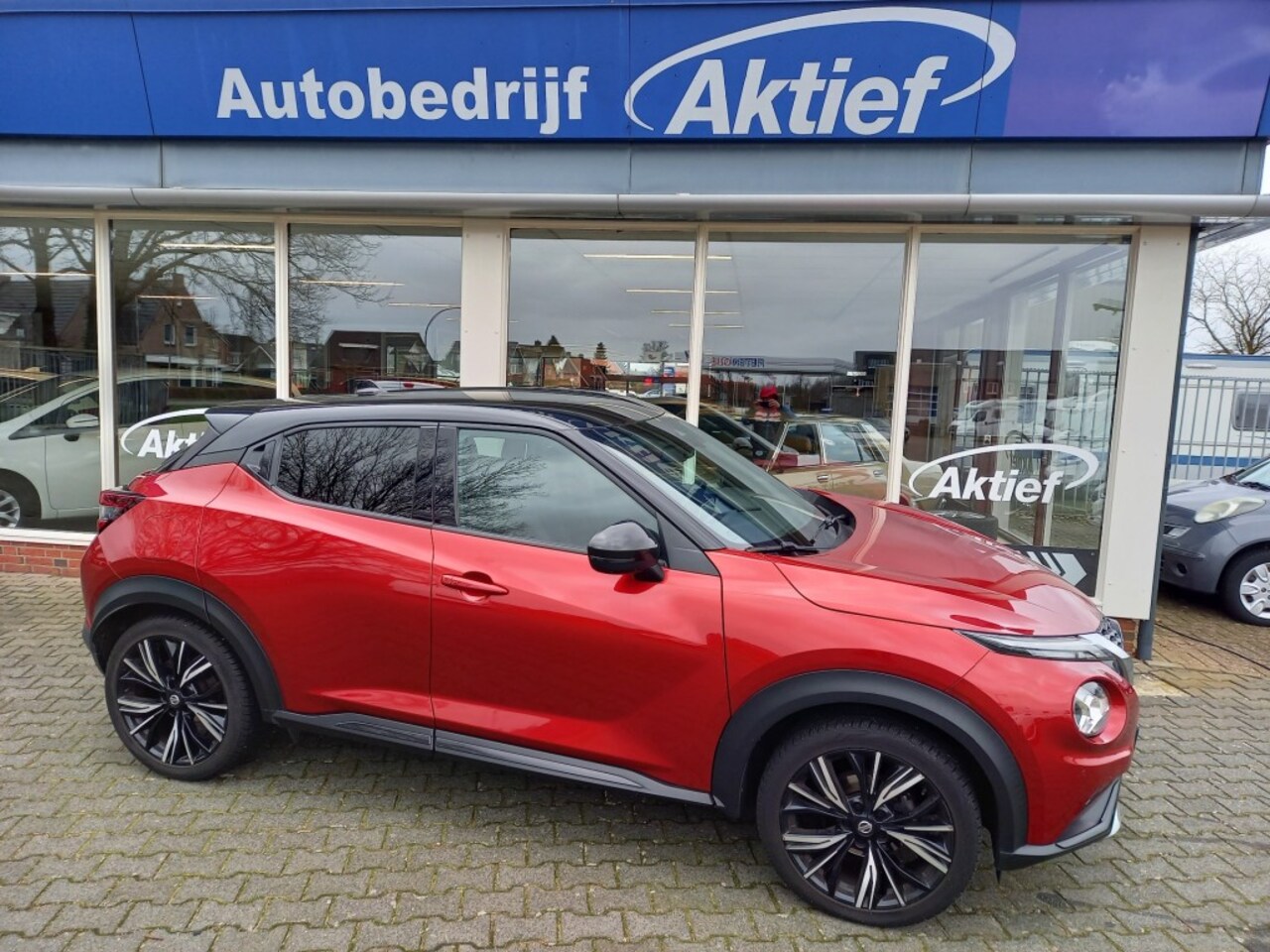 Nissan Juke - 1.0 DIG-T N-DESIGN BOSE - AutoWereld.nl