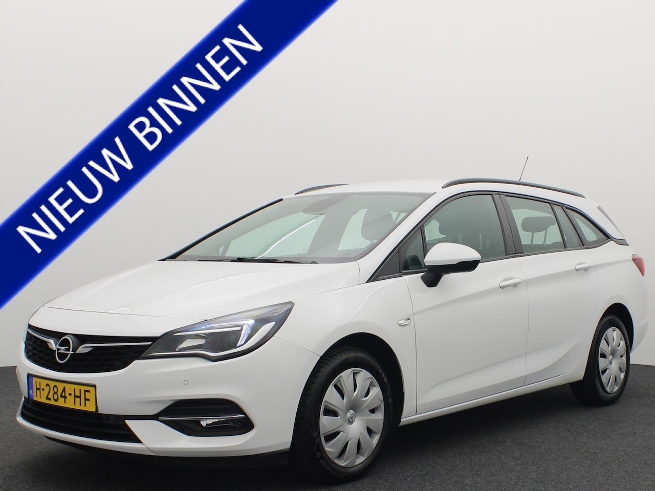 Opel Astra Sports Tourer - 1.2 146PK Business Edition NAVI / CLIMA / PDC / BLUETOOTH / CARPLAY / CRUISE / NL-AUTO - AutoWereld.nl