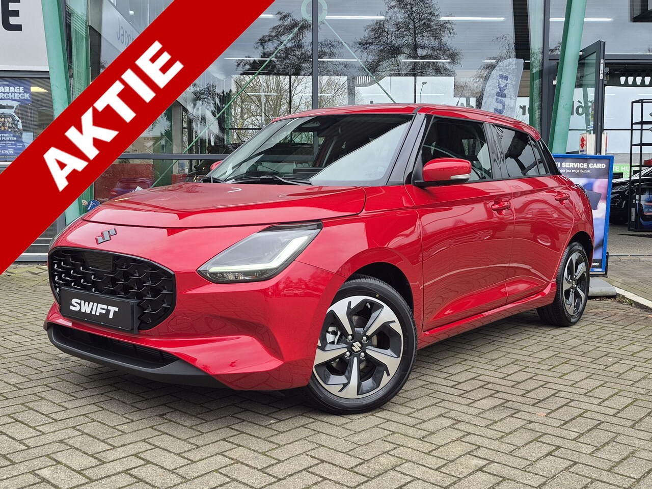 Suzuki Swift - 1.2 Style Smart Hybrid | Excl. Tijdelijke €2000 KORTING | Burning Red Pearl + Zwarte logo - AutoWereld.nl