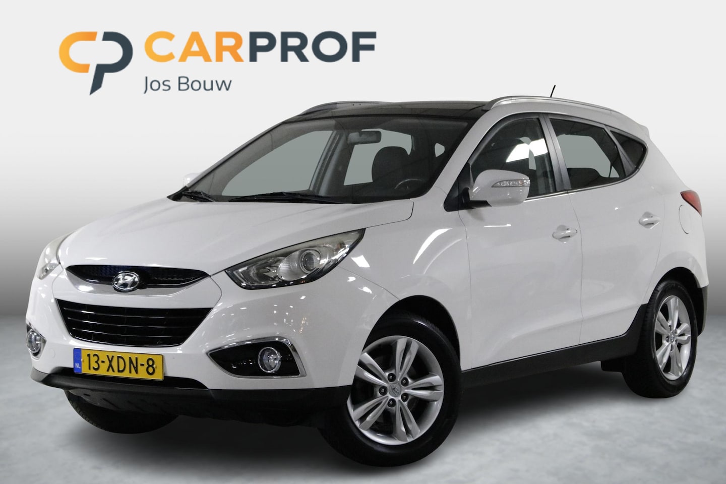 Hyundai ix35 - 2.0i 4WD Business Edition 163 PK AUTOMAAT! Clima | Camera | Cruise | Trekhaak | Navi | Blu - AutoWereld.nl