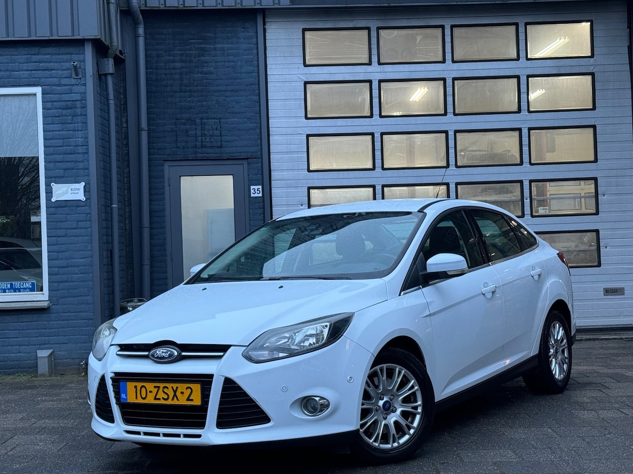 Ford Focus - 1.6 EcoBoost Titanium | Clima | Navi | Cruise | PDC | 150PK - AutoWereld.nl