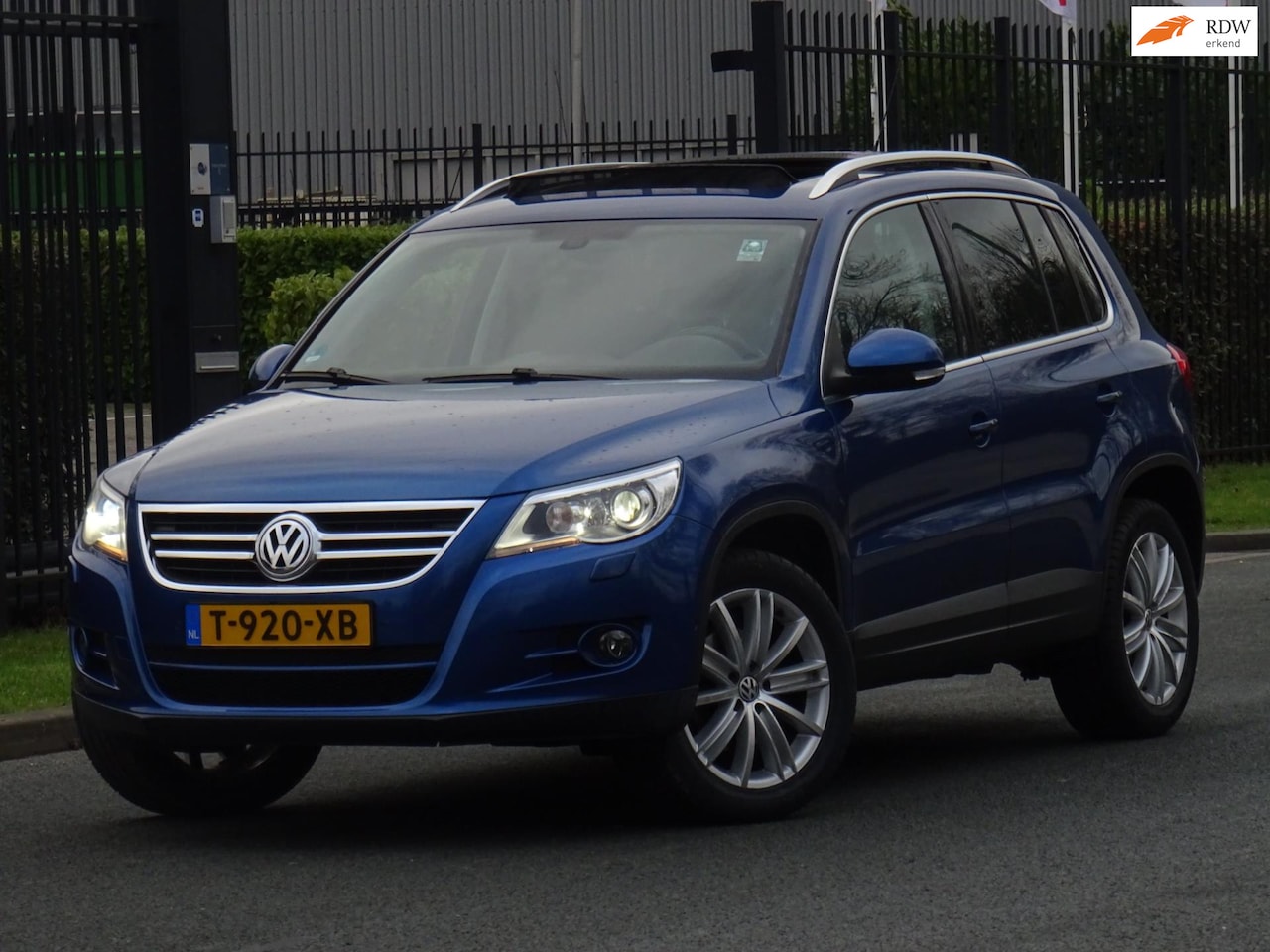 Volkswagen Tiguan - 2.0 TSI Track&Field 4Motion FULL OPTIONS - AutoWereld.nl