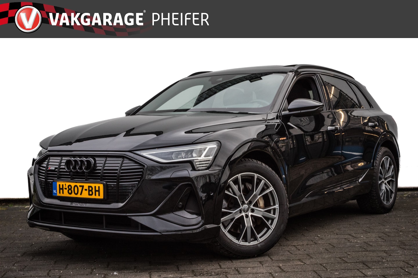 Audi e-tron - e-tron 50 quattro S-Line Launch edition Black 71 kWh Panoramadak/ Sportstoelen/ Luchtverin - AutoWereld.nl