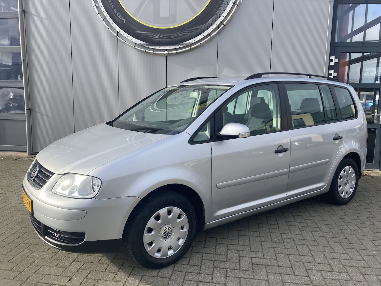 Volkswagen Touran - 1.4 TSI Optive II Trekhaak | Airco | Cruise control - AutoWereld.nl