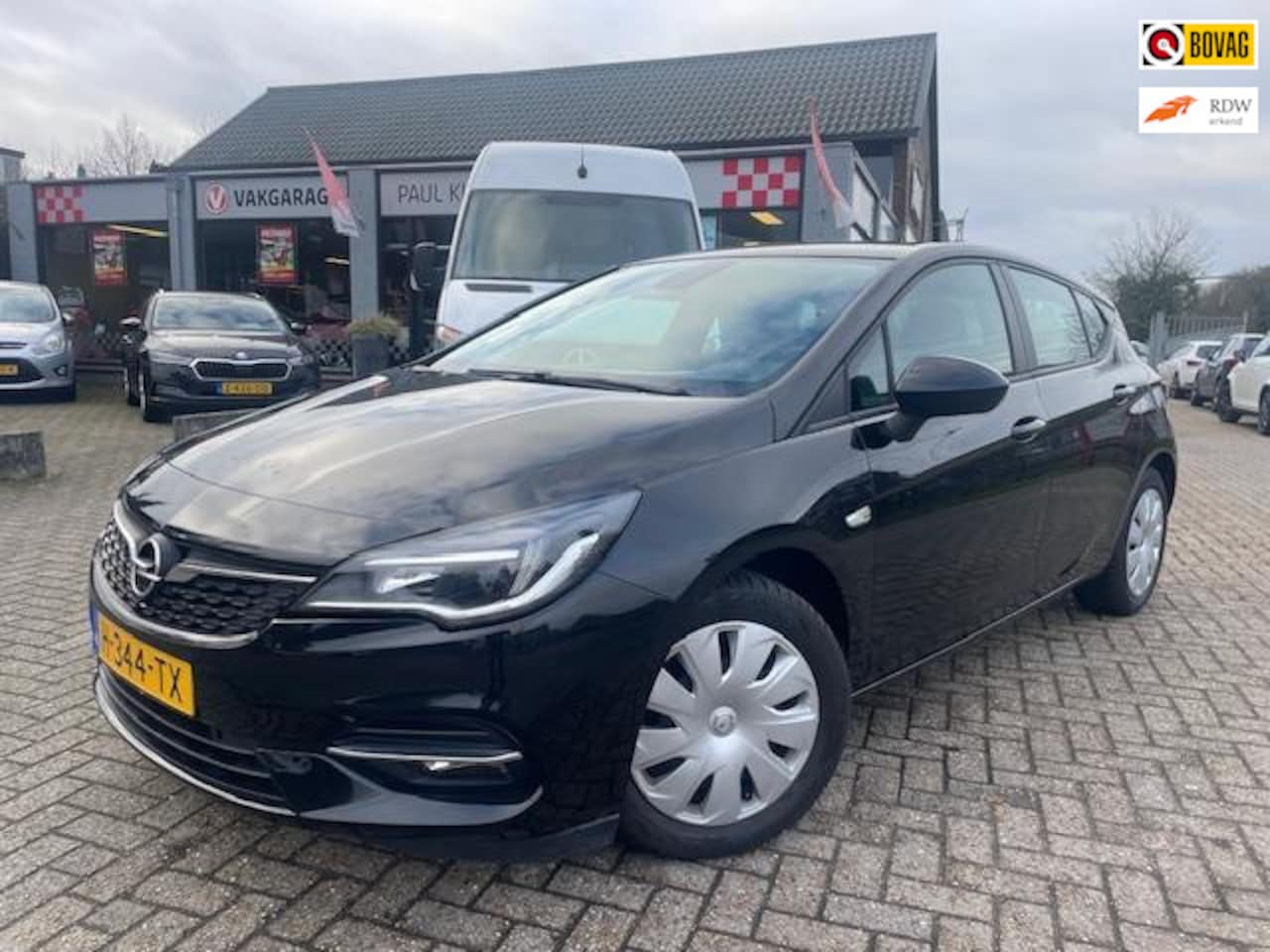 Opel Astra - 1.2 110pk Business Edition *navi + pdc + 1e eigenaar* - AutoWereld.nl